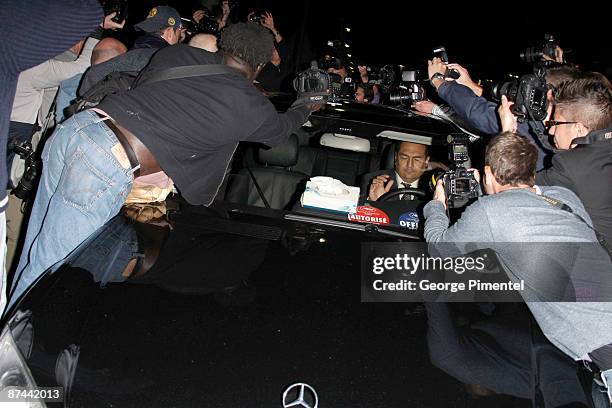 General view of paparazzi swarming actress/singer Mariah Carey's car as she is seen leaving the Roberto Cavalli dinner held at Roberto Cavalli's...