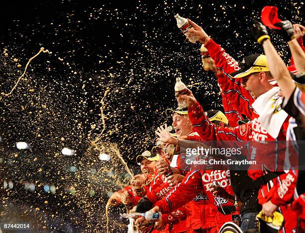 The Office Depot/Old Spice team celebrates after winning the NASCAR Sprint All-Star Race on May 16, 2009 at Lowe's Motor Speedway in Concord, North...