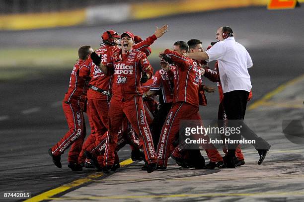The Office Depot/Old Spice crew celebrates on pit road after winning the NASCAR Sprint All-Star Race on May 16, 2009 at Lowe's Motor Speedway in...