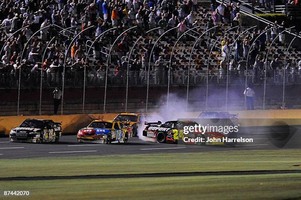 Jeff Gordon driver of the DuPont Chevrolet spins coming off of turn 4 during the NASCAR Sprint All-Star Race on May 16, 2009 at Lowe's Motor Speedway...