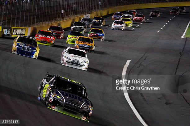 Jimmie Johnson driver of the Lowe's Chevrolet leads the field during the NASCAR Sprint All-Star Race on May 16, 2009 at Lowe's Motor Speedway in...