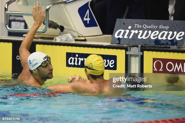 Chad Le Clos of South Africa and Cameron McEvoy of Australia shake hands after the the Men's 200m Freestyle Final during day two of the FINA Swimming...