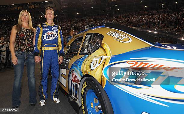 Kurt Busch, driver of the Miller Lite Dodge and his wife Eva, observe the National Anthem during the NASCAR Sprint All-Star Race on May 16, 2009 at...