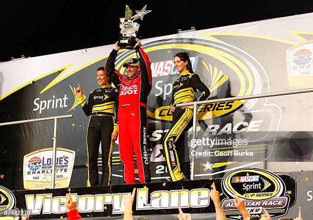 Tony Stewart, driver of the Office Depot Chevrolet, celebrates in victory lane after winning the NASCAR Sprint All-Star Race on May 16, 2009 at...