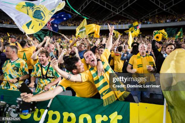 Socceroo fans celebrate after the teams win at the 2018 FIFA World Cup Qualifiers Leg 2 match between the Australian Socceroos and Honduras at ANZ...