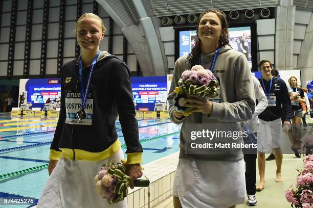 Sarah Sjostrom of Sweden share a laugh during the victory ceremony on day two of the FINA Swimming World Cup at Tokyo Tatsumi International Swimming...