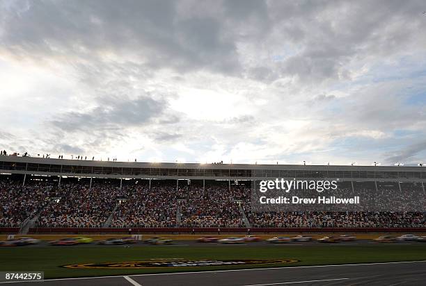 Cars race during the NASCAR Sprint All-Star Showdown on May 16, 2009 at Lowe's Motor Speedway in Concord, North Carolina.