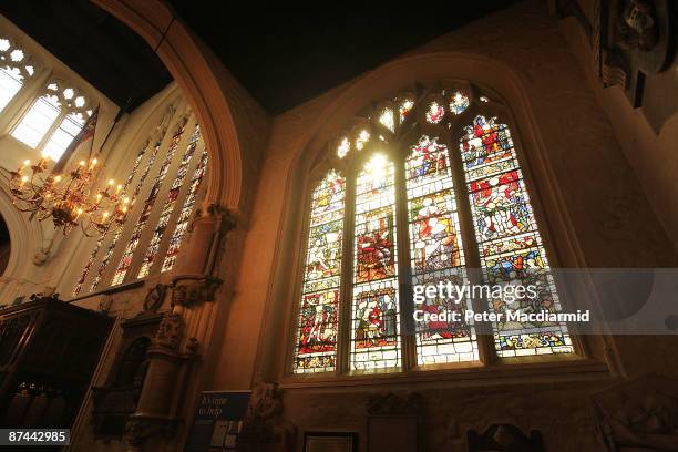 Afternoon sunshine streams through the Milton window at St. Margaret's Church on May 15, 2009 in London. St. Margaret's Church, which stands in the...