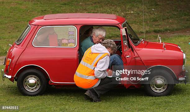 Mini enthusiasts gather in Crystal Palace Park to celebrate the 50th anniversary of the car and to prepare for the annual "London To Brighton Mini...