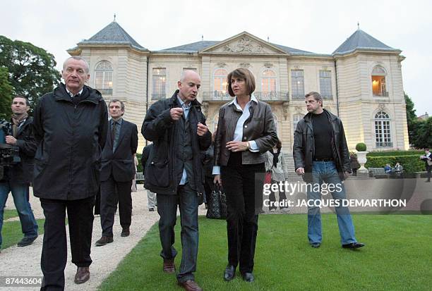 French Culture minister Christine Albanel speaks with French artiste Ange Leccia next to Rodin's museum curator Dominique Vieville as they visit the...