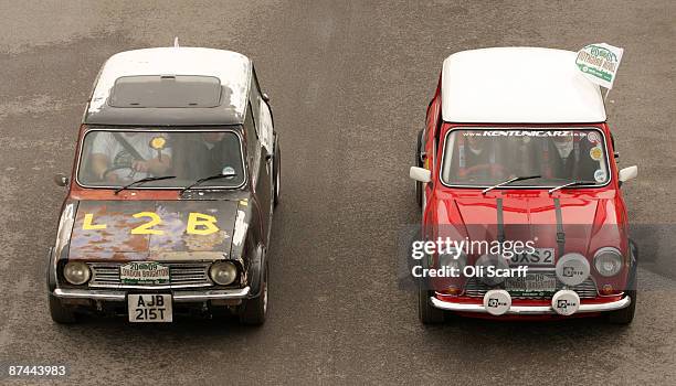 Mini owners celebrating the 50th anniversary of the car drive through Crystal Palace Park at the start of the annual "London to Brighton Mini Run" on...