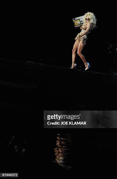 Actress Pamela Anderson performs during the opening ceremony of the 17th Life Ball in Vienna late on May 16, 2009. Life Ball is Europe's largest...