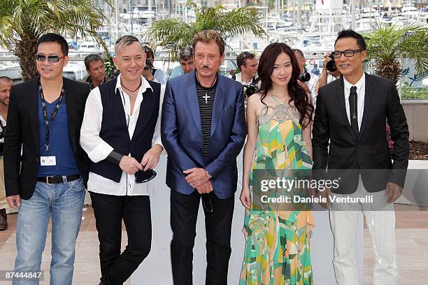 Actors Johnny Hallyday , Anthony Wong , Michelle Ye and Simon Yam attend the Vengeance Photo Call at the Palais des Festivals during the 62nd Annual...