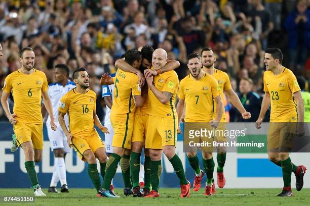 Mile Jedinak of Australia celebrates scoring a goal with team mates during the 2018 FIFA World Cup Qualifiers Leg 2 match between the Australian...