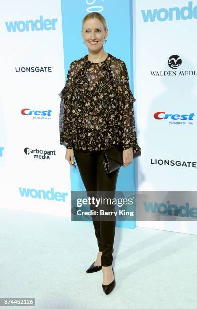 Actress Janel Moloney attends the premiere of Lionsgates's' 'Wonder' at Regency Village Theatre on November 14, 2017 in Westwood, California.