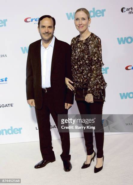 Composer Marcelo Zarvos and actress Janel Moloney attend the premiere of Lionsgates's' 'Wonder' at Regency Village Theatre on November 14, 2017 in...