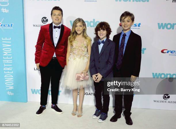 Actors Ty Consiglio, Elle McKinnon, Kyle Breitkopf and James A. Hughes attend the premiere of Lionsgates's' 'Wonder' at Regency Village Theatre on...