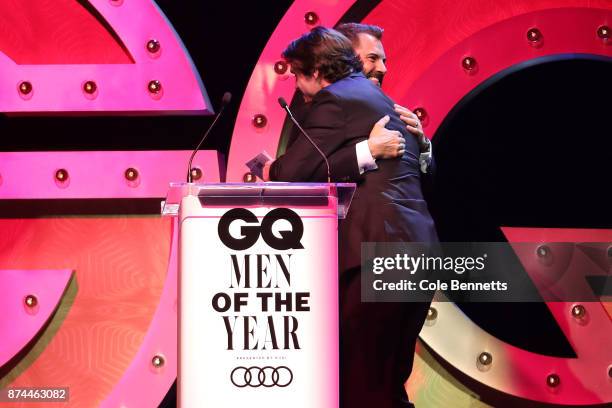 Daniel MacPherson and RJ Mitte embrace during the GQ Men Of The Year Awards Ceremony at The Star on November 15, 2017 in Sydney, Australia.
