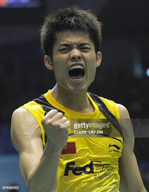China's Lin Dan reacts to a winning point against South Korea's Park Sung Hwan during the men's singles final match at the Sudirman Cup world...