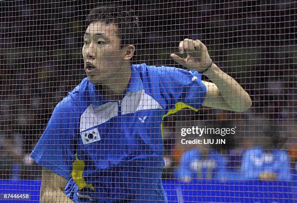 South Korea's Park Sung Hwan reacts during the men's singles final match against China's Lin Dan at the Sudirman Cup world badminton championships at...