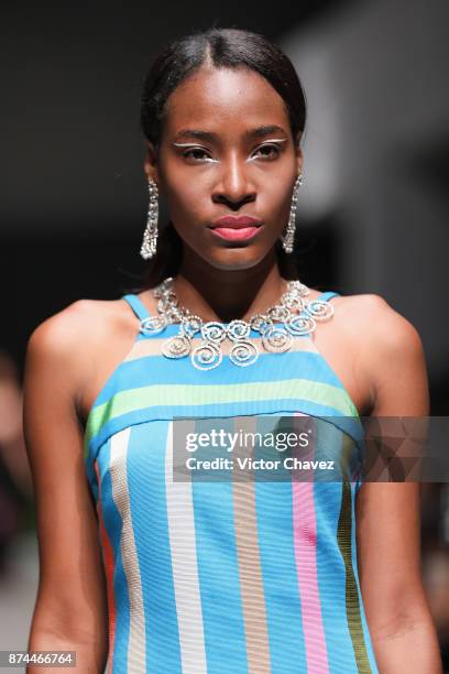 Model walks the runway during the Lydia Lavin show at Mercedes Benz Fashion Week Mexico Spring/Summer 2018 at Altto San Angel on November 14, 2017 in...