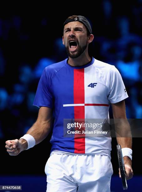 Lukasz Kubot of Poland partner of Marcelo Melo of Brazil celebrates victory during the doubles match against Mike Bryan of The United States and Bob...