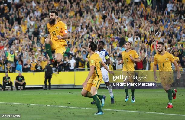 Mile Jedinak of Australia celebrates scoring a goal during the 2018 FIFA World Cup Qualifiers Leg 2 match between the Australian Socceroos and...