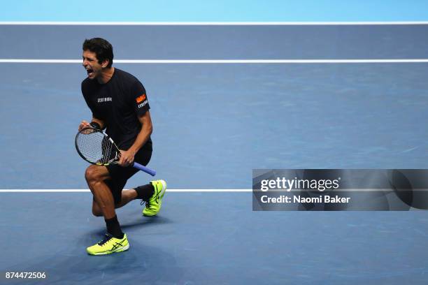 Marcelo Melo of Brazil partner of Lukasz Kubot of Poland celebrates a point during the doubles match against Bob Bryan of The United States and Mike...