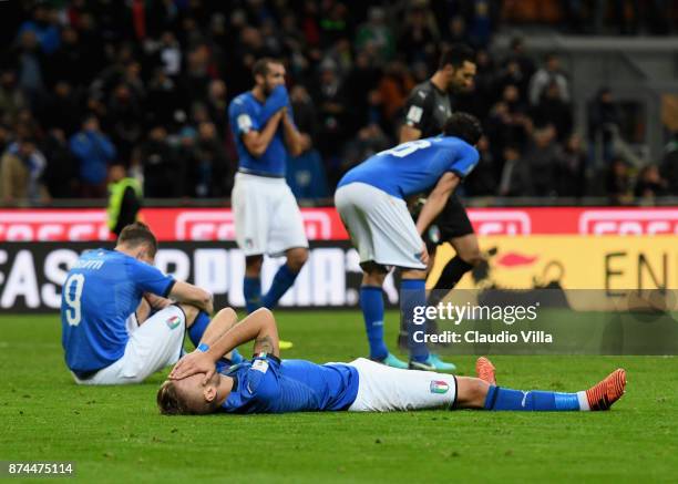 Players of Italy dejected at the end of the FIFA 2018 World Cup Qualifier Play-Off: Second Leg between Italy and Sweden at San Siro Stadium on...