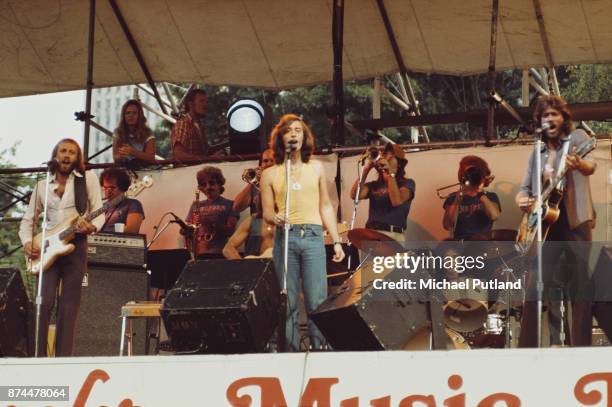 Pop vocal trio the Bee Gees performing at Schaefer Music Festival, New York, 9th July 1975. Left to right: Maurice Gibb , Robin Gibb, and Barry Gibb.