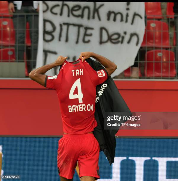 Jonathan Tah of Leverkusen gives away his jersey after the Bundesliga match between Bayer 04 Leverkusen and 1. FC Koeln at BayArena on October 28,...