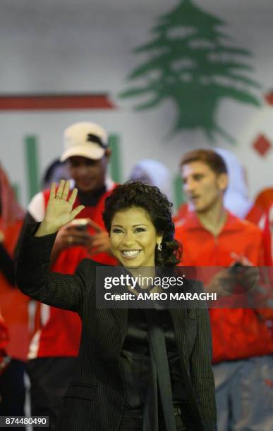 Egyptian singer Sherine Abdel Wahab performs prior to the football game between Egypt and Lebanon and Arab stars in support of Lebanon at Cairo...