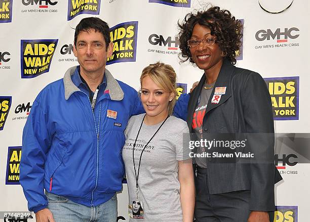 Founder/Producer of AIDS Walk New York Craig R. Miller, singer Hilary Duff and CEO of Gay Men's Health Crisis Dr. Marjorie J. Hill attend the opening...