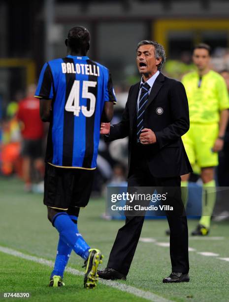 Inter Milan head coach Josè Mourinho congratulates goal scorer Mario Balotelli during the Serie A match between Inter Milan Milan and AC Siena, at...