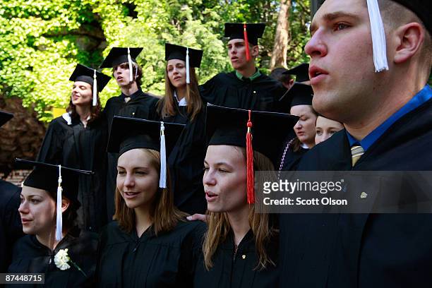 Notre Dame University students hold an alternative commencement ceremony to protest the visit by President Barack Obama at the Grotto of Our Lady of...