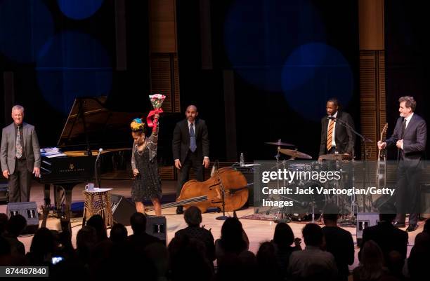 American Jazz vocalist Catherine Russell, with her band, takes a bow after their performance during the Harlem On My Mind' concert, part of 'The...
