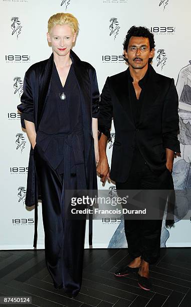 Actress Tilda Swinton and fashion designer Haider Ackermann arrives at the 1835 Hotel Re-Opening Party at the 1835 Hotel during the 62nd...