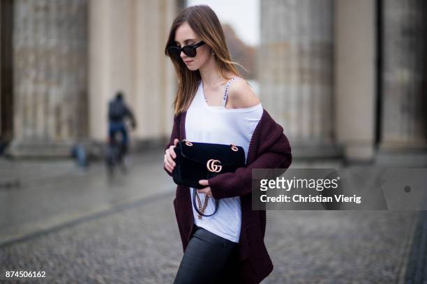 Barbora Ondrackova wearing white tshirt Topshop, black Balenciaga leggings, a bordeaux Topshop cardigan, Dior bralette, black Gucci bag, Balenciaga...