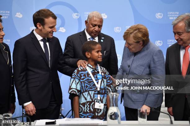 Frank Bainimarama , Prime Minister of Fiji and President of COP 23, French President Emmanuel Macron , German Chancellor Angela Merkel and UN...