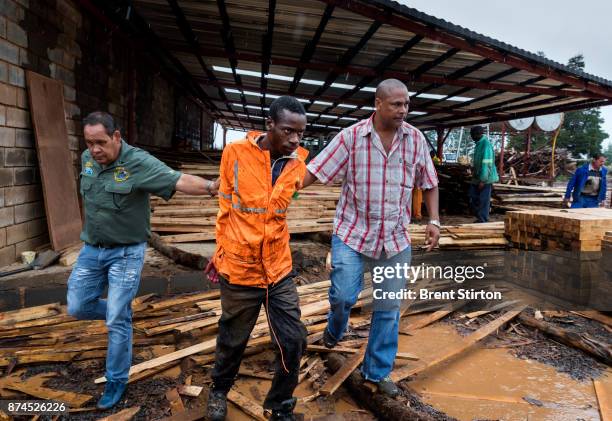 South African Police and members of Heritage Protection Group, an NGO specializing in serious crime investigation, arrest farm attackers in...