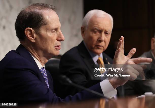 Senate Finance Committee chairman Orrin Hatch interrupts ranking member Sen. Ron Wyden during a markup by the committee of the Republican tax reform...