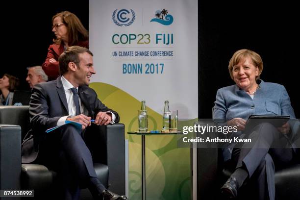 German Chancellor Angela Merkel and French President Emmanuel Macron attend the COP 23 United Nations Climate Change Conference on November 15, 2017...