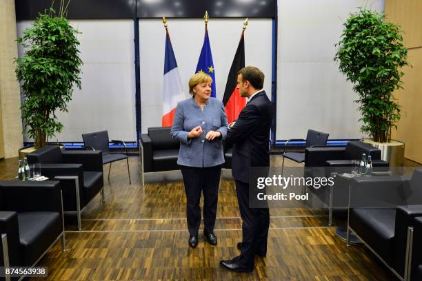 German Chancellor Angela Merkel and French president Emanuel Macron hold a bilateral talk during the UN Climate Change Conference COP23 on November...