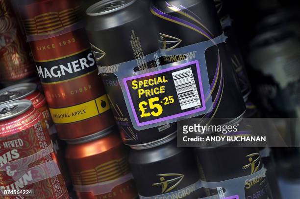 Price tags announcing special prices are displayed at a liquor store in Glasgow on November 15, 2017. Britain's top court on November 15 supported...