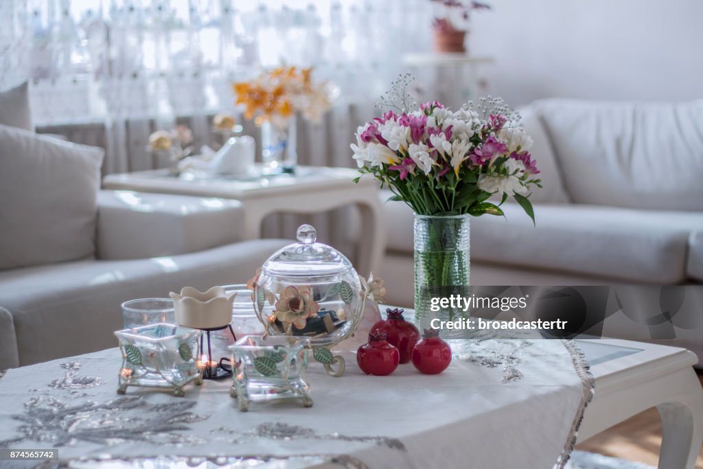 Flowers on white table in room