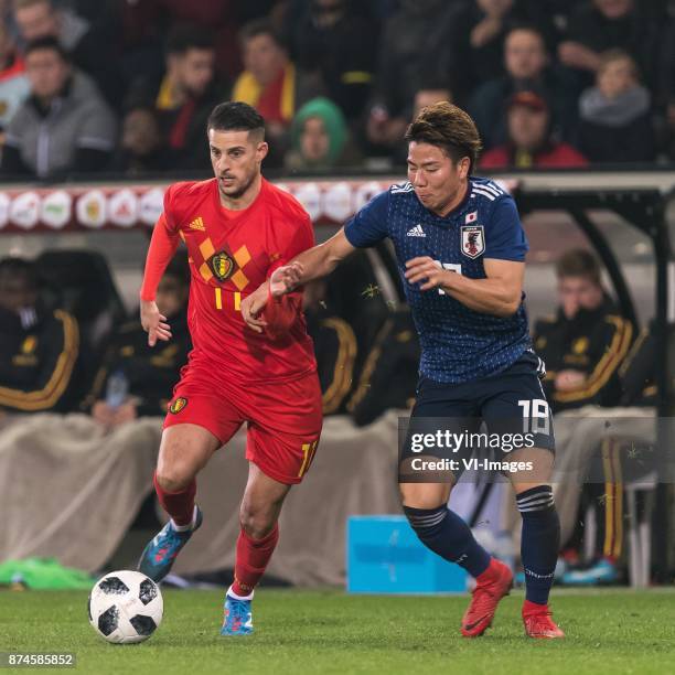 Kevin Mirallas of Belgium, Takuma Asano of Japan during the friendly match between Belgium and Japan on November 14, 2017 at the Jan Breydel stadium...