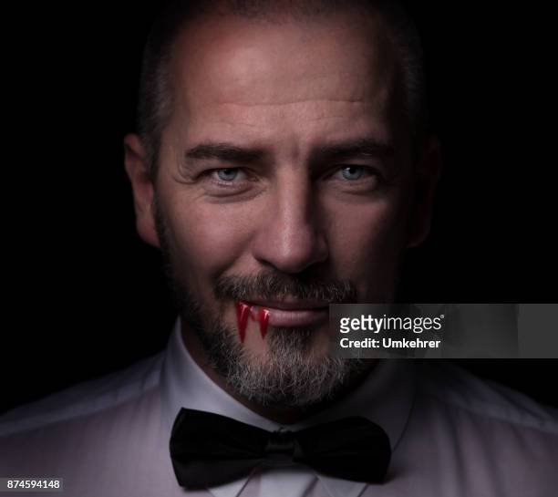 smart vampire with blood - count dracula stock pictures, royalty-free photos & images
