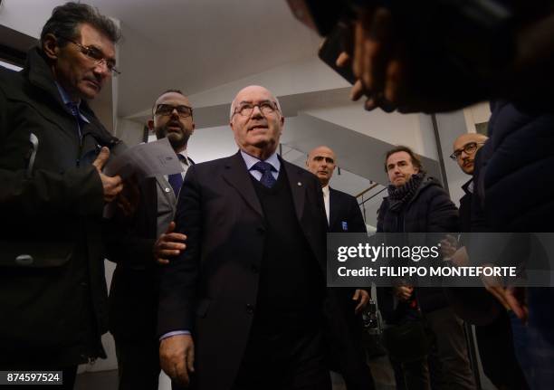 Italian Football Federation Carlo Tavecchio arrives to speak to journalists outside the Italian Football Federation headquarters on November 15 2017,...
