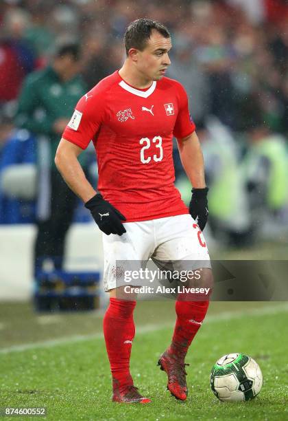 Xherdan Shaqiri of Switzerland looks to pass the ball during the FIFA 2018 World Cup Qualifier Play-Off second leg match between Switzerland and...