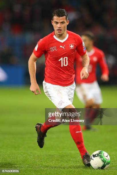 Granit Xhaka of Switzerland runs with the ball during the FIFA 2018 World Cup Qualifier Play-Off second leg match between Switzerland and Northern...